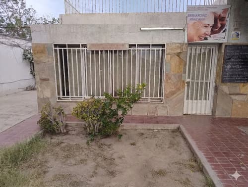 Terreno de 2129 m2 con casa rivadavia