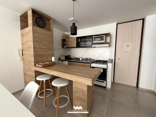 Venta departamento 1 dormitorio con balcon cochera y pileta centro villa carlos paz