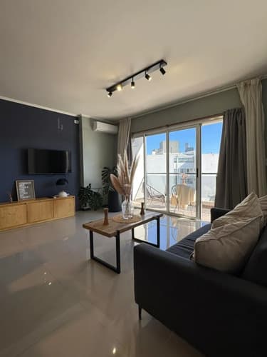 Departamento 2 dormitorios con doble balcon y cochera en villa carlos paz